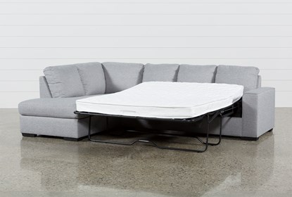 Lucy Grey 2 Piece Sleeper Sectional With Left Arm Facing Chaise .