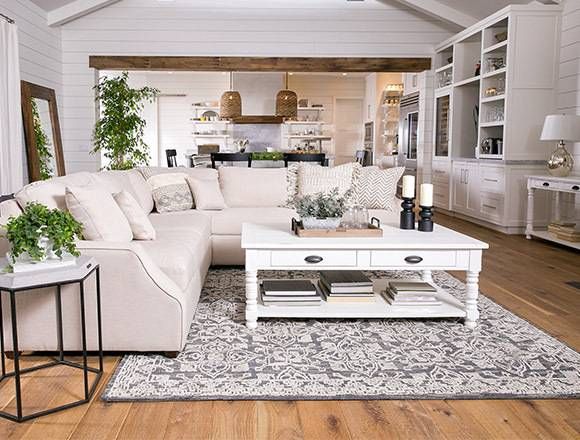 country/rustic dining room with Magnolia Home Homestead sofa .