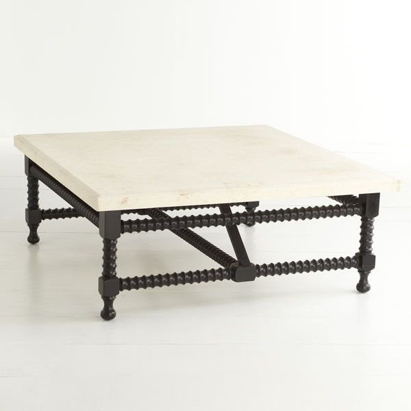 Spanish travertine top coffee table from Wisteria. $1199. Love .