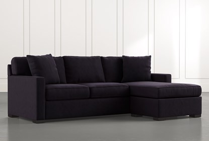 Taren II Black Reversible Sofa/Chaise Sleeper W/Storage Ottoman .