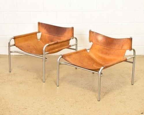 Cognac saddle leather Model 250 lounge chair by Walter Antonis .