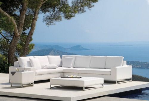 Utilise the outdoor space by fixing contemporary outdoor furniture .