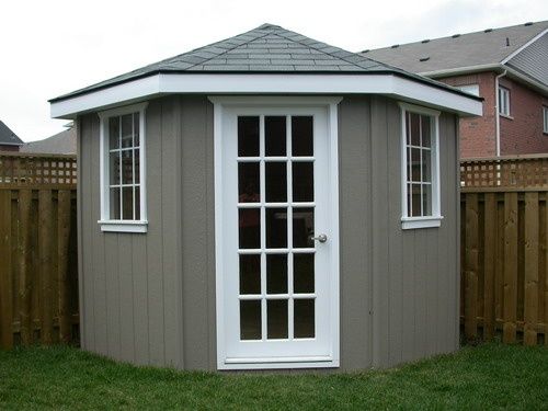 DIY corner shed. exchange the white trim for teal! sooo pretty .