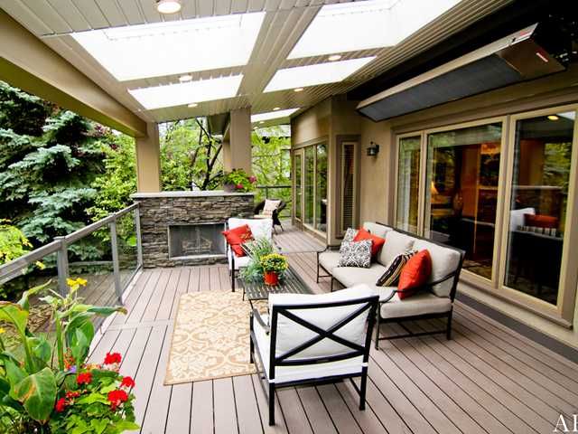 Amazing outdoor space with covered deck including skylights, gas .