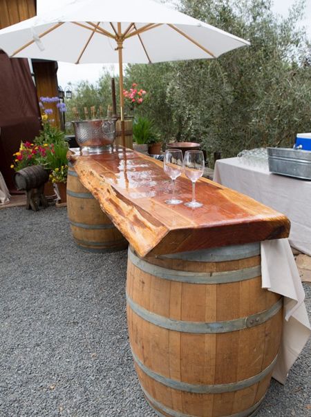 DIY outdoor bar ideas using wine barrels http://avinawinetools.com .