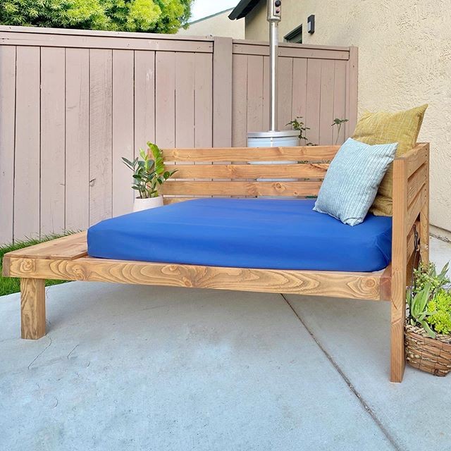 Outdoor daybed with side tab