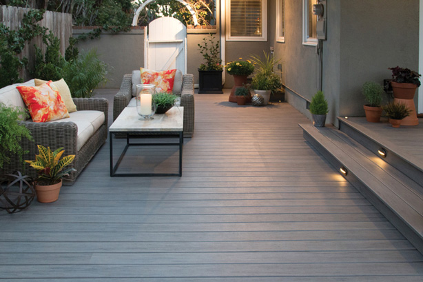 Decking, bedded plants, garden room for modern outdoor living spac