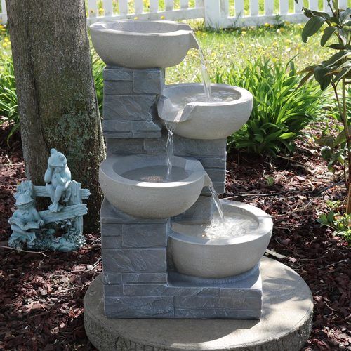 Serenity Health's outdoor backyard water fountains & outdoor patio .