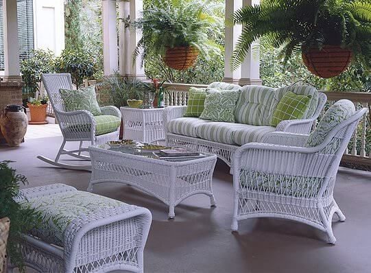 Coastal white wicker patio furniture set with matching coffee .