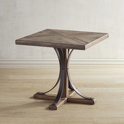The Iron Trestle Shop Floor End Table from the Magnolia Home .