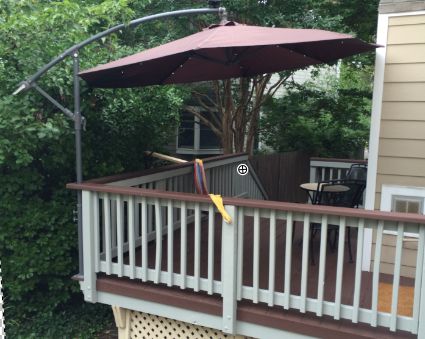 mount a cantilever umbrella outside the deck rail to save valuable .