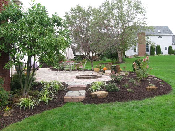 15 Landscaping Ideas Around Patio and Paved Are